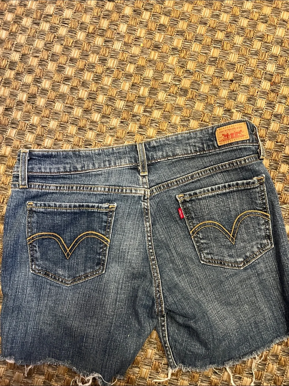 Levi's light blue denim shorts with frayed hem
